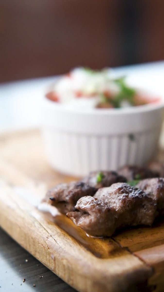 Barg lamb kebab served with saffron rice and grilled tomato
